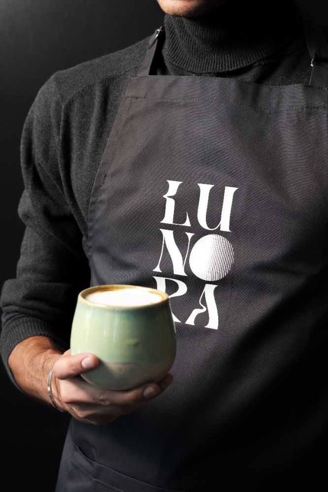 lunora making coffee